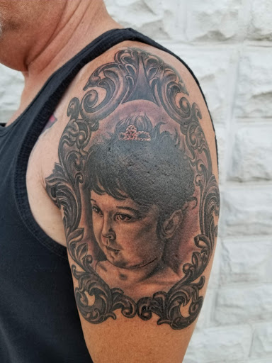 Explore la tattoo ideas, creative tattoo ideas in Lockport, available at Tattoo City by Larry Brogan