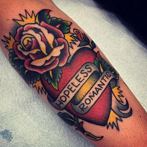 Explore heart and rose tattoo ideas, creative tattoo ideas in Olympia, available at Capitol City Tattoo and Piercing