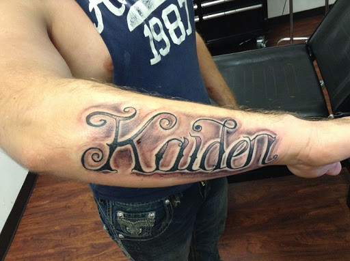 Explore first daughter tattoo ideas, creative tattoo ideas in Seymour, available at American Gypsy Tattoo Corp.