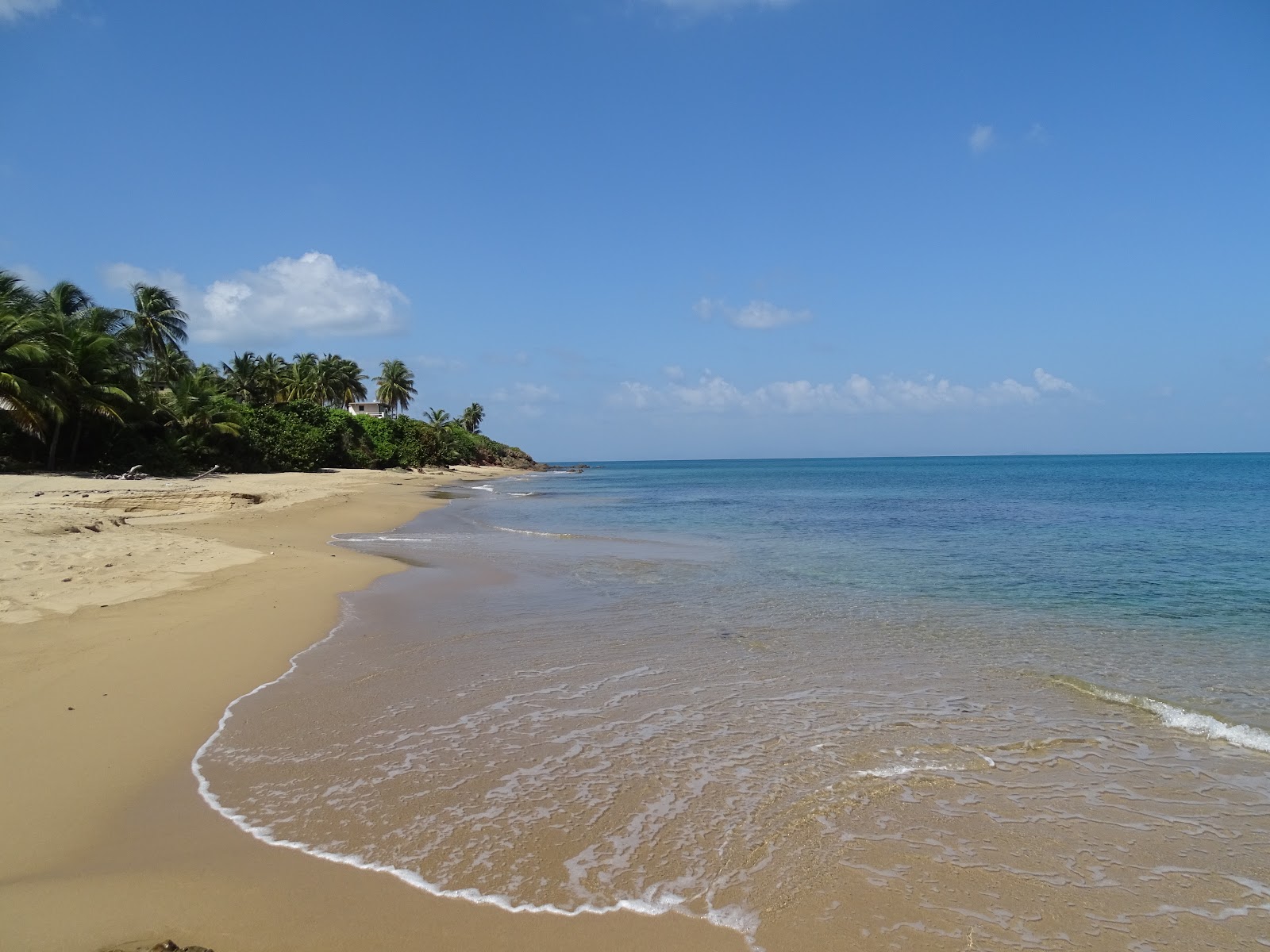 Photo of Sea Glass beach II with bright sand & rocks surface