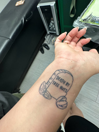 Explore bald head tattoo ideas, creative tattoo ideas in Peoria, available at The Ink Bar