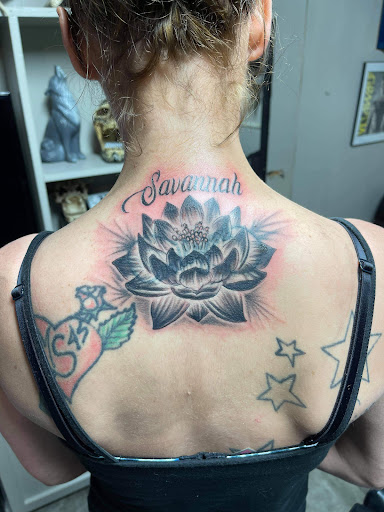 Find tattoo ideas for the back for your next unique tattoo in Idaho Falls at Spiders Web