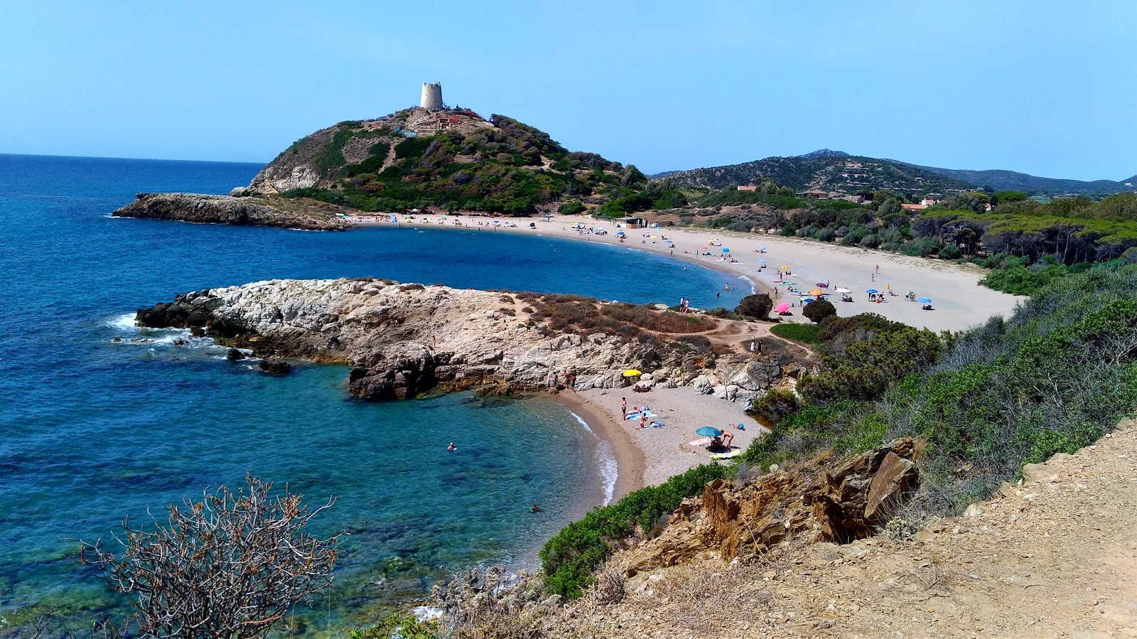 Fotografija Spiaggia di Su Portu z lahki fini kamenček površino
