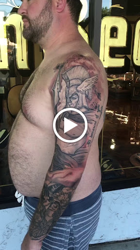 Explore foo fighters tattoo ideas, creative tattoo ideas in Marietta, available at The Queen Bee Tattoo and Piercing Parlour