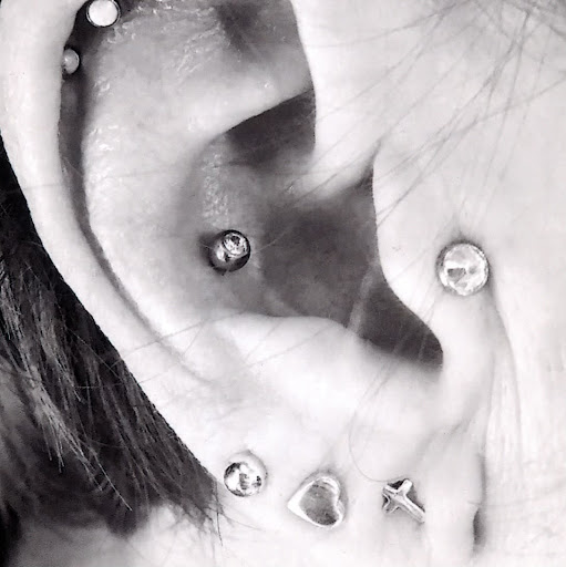 Explore wow tattoo ideas, creative tattoo ideas in San Clemente, available at Distinctive Body Art Studio Tattoo & Piercing