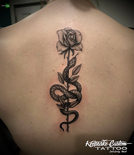 Explore outdoorsman tattoo ideas, creative tattoo ideas in Salisbury, available at Keepsake Custom Tattoo & Body Piercing Laser Tattoo Removal