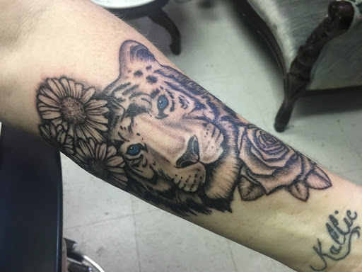 Explore brother tattoo ideas, creative tattoo ideas in Centre, available at Leftys