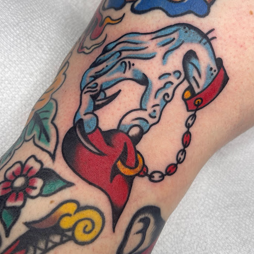 Explore tattoo flag ideas, creative tattoo ideas in Johnson City, available at Gold Cross Tattoo Co.