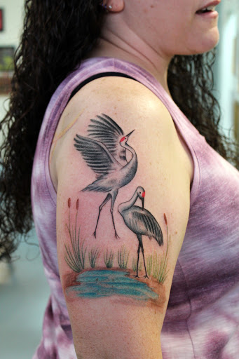 Explore mother of two tattoo ideas, creative tattoo ideas in Fort Myers, available at Tiger Lotus Tattoo and Piercing