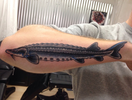 Explore squid tattoo ideas, creative tattoo ideas in Sacramento, available at 13 MAG TATTOO