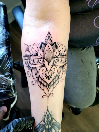 Explore wedding band tattoo ideas, creative tattoo ideas in Warrensburg, available at Altered Visions Tattoo Studio