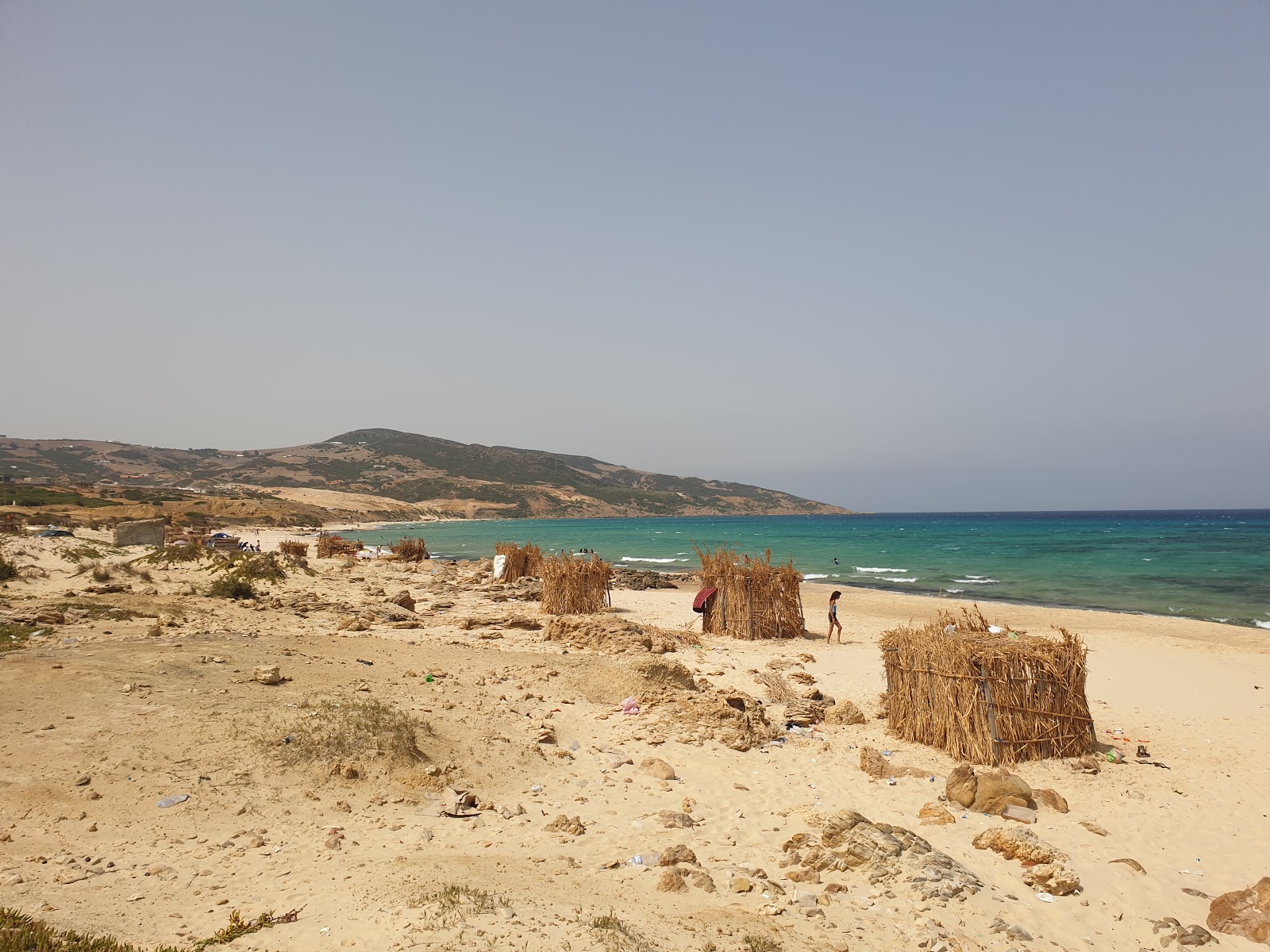 Foto av Kef Abbed Beach med beige sand yta