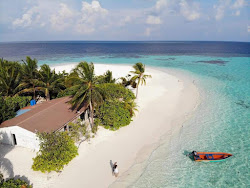 Foto von Dhangethi Beach mit geräumige küstenlinie