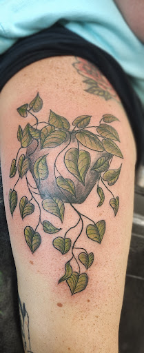 Explore female thigh tattoo ideas, creative tattoo ideas in Lewiston, available at Walkins tattoos studio