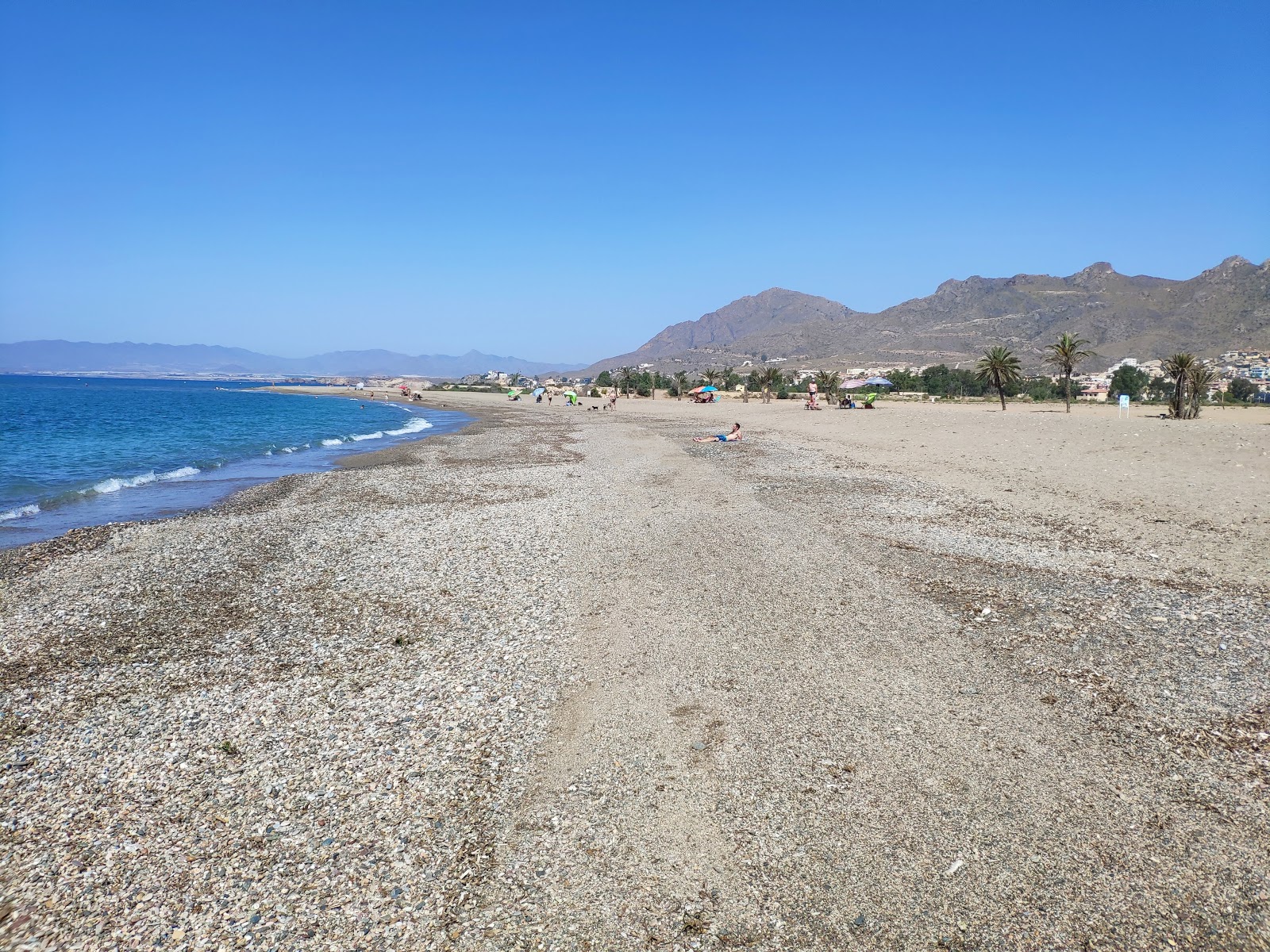 Valokuva Playa Caninaista. pinnalla turkoosi puhdas vesi:n kanssa