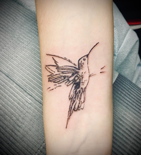 Explore to the moon and back tattoo ideas, creative tattoo ideas in Puyallup, available at Inkstaind Tattoo Studio