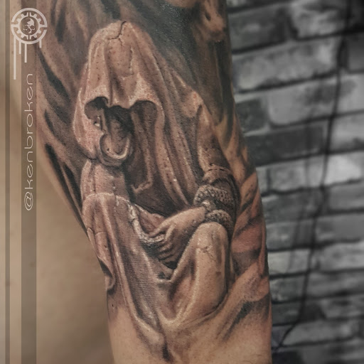 Find tattoo ideas snake for your next unique tattoo in Woodside at Fiction Tattoo Inc.