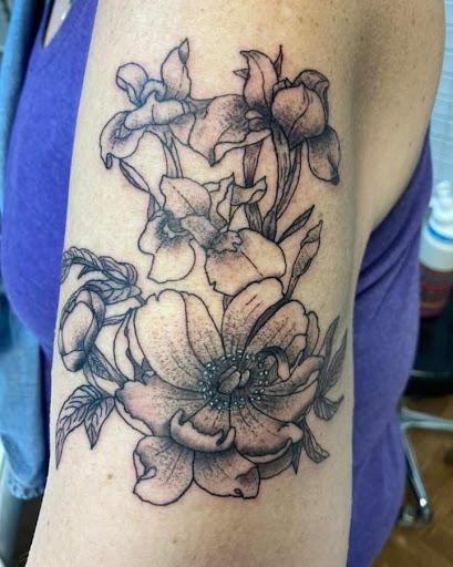 Explore side face tattoo ideas, creative tattoo ideas in Milan, available at Davis Tattoo Company