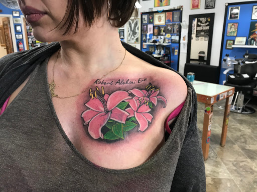 Explore neck tattoo ideas for females, creative tattoo ideas in Colorado Springs, available at Leftys Tattoo