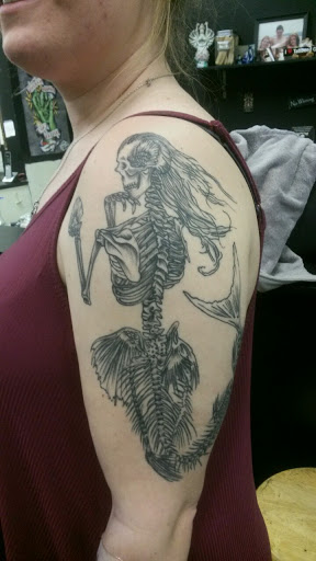 Explore tattoo ideas for dad and daughter, creative tattoo ideas in Hamilton, available at A New Part of You Tattoos and Piercings