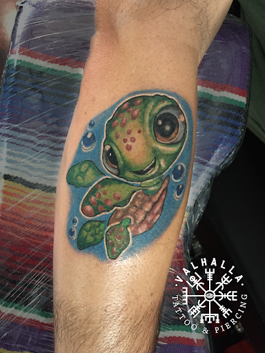 Explore macabre tattoo ideas, creative tattoo ideas in Rogers, available at Valhalla Tattoo & Piercing Studio