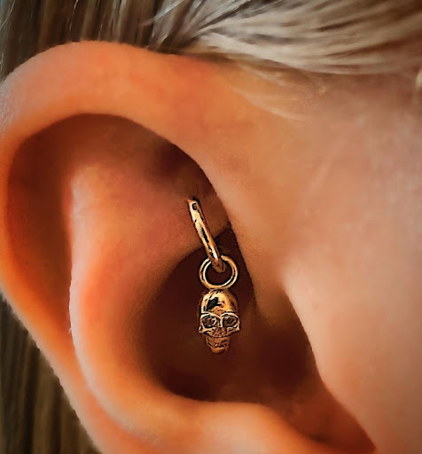 Explore one piece tattoo idea, creative tattoo ideas in Venice, available at Ink Monkey Tattoo and Piercing