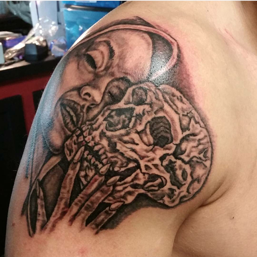 Explore tattoo father daughter ideas, creative tattoo ideas in Erie, available at EliKingInk