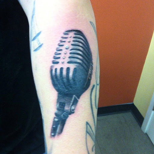 Explore black tattoo ideas for women, creative tattoo ideas in Florence, available at Iron Crow Tattoo Co.