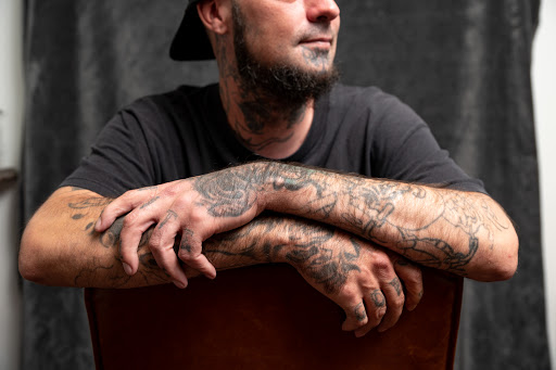 Explore minimalist dog tattoo ideas, creative tattoo ideas in Akron, available at Knuckle Up Ink Tattoos