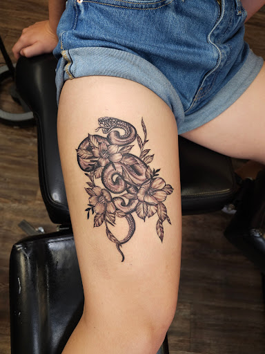 Explore october birth flower tattoo ideas, creative tattoo ideas in Mesa, available at Ranger Tattoo & Piercing