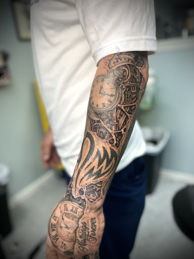 Find angel tattoo ideas for ladies for your next unique tattoo in Ocala at Beauty in a Canvas Tattoo and Art Gallery