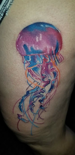 Explore gucci tattoo ideas, creative tattoo ideas in Angola, available at Hoodlum Ink