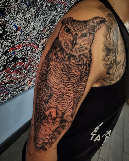 Explore tattoo sleeve filler ideas for a man, creative tattoo ideas in Palm Harbor, available at Angry Owl Tattoo and Piercing