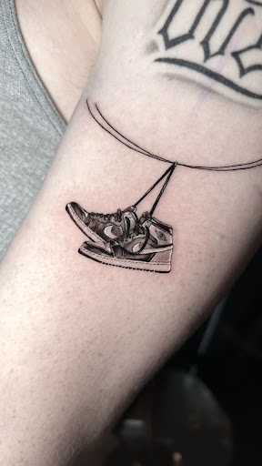 Explore simple spine tattoo ideas, creative tattoo ideas in San Antonio, available at Ink & Iron Tattoos & Piercings