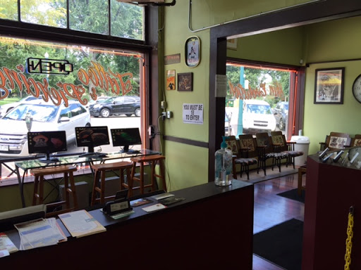 Explore bookworm tattoo ideas, creative tattoo ideas in Colorado Springs, available at Skin Evolution Tattoo