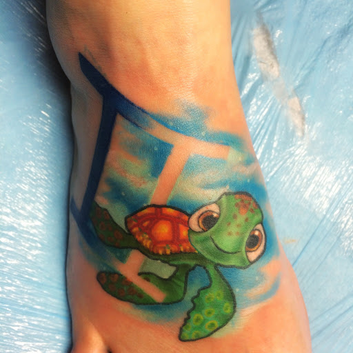 Explore men's rib tattoo ideas, creative tattoo ideas in West Lafayette, available at Renegade Tattoo Studio