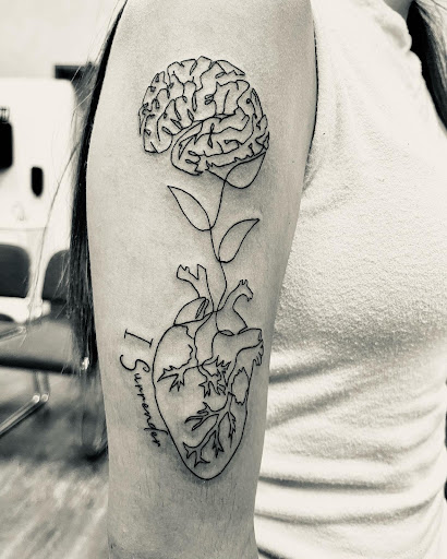 Explore down syndrome tattoo ideas, creative tattoo ideas in Lubbock, available at Stay True Tattoo & Body Piercing Studio