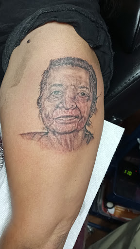 Explore ankle tattoo ideas for men, creative tattoo ideas in Odessa, available at Evil Ink Tattoo