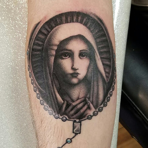 Explore granddaughter tattoo ideas for grandma, creative tattoo ideas in Pittsburgh, available at Pittsburgh Tattoo Company