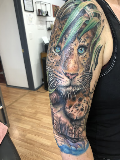 Explore push tattoo ideas, creative tattoo ideas in Sarasota, available at SEVEN SINS Tattoo Studio