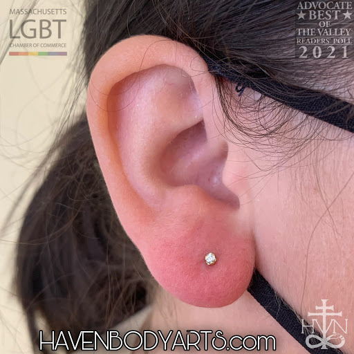 Explore cover up tattoo ideas for upper arm, creative tattoo ideas in Northampton, available at Haven Body Arts Piercing & Tattoo