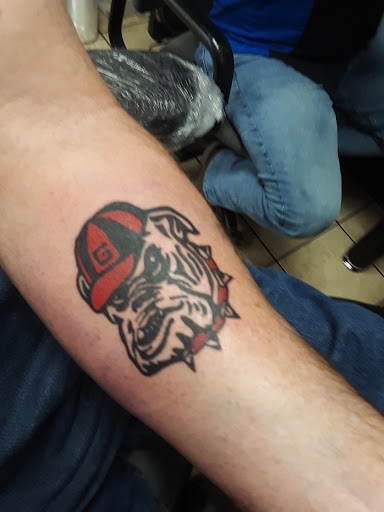Explore daddy and son tattoo ideas, creative tattoo ideas in Pendleton, available at Artistic Ink