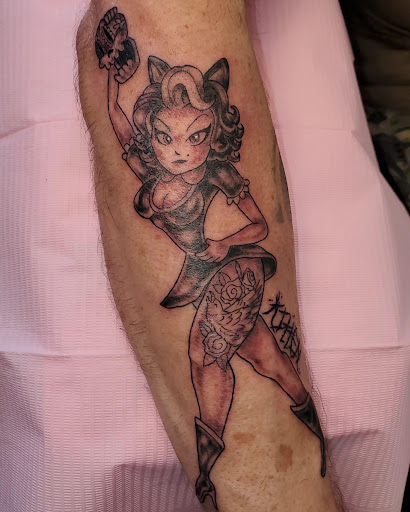 Find alpha and omega tattoo ideas for your next unique tattoo in Palm Harbor at Angry Owl Tattoo and Piercing