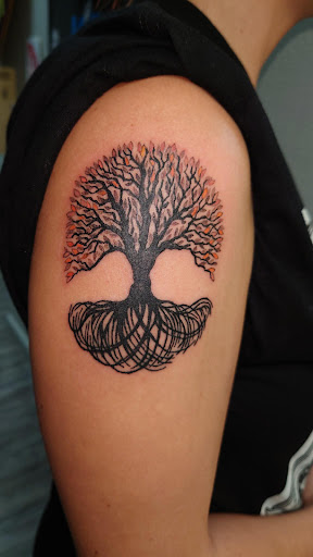 Explore dogwood tattoo ideas, creative tattoo ideas in Jonesboro, available at Immortal Ink