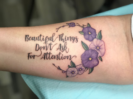 Explore side hand tattoo ideas, creative tattoo ideas in Ocala, available at The Tattoo Gallery of Ocala LLC