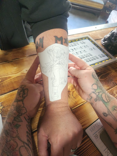 Explore men's rib tattoo ideas, creative tattoo ideas in Seymour, available at Popseys Electric Tattooing Co.