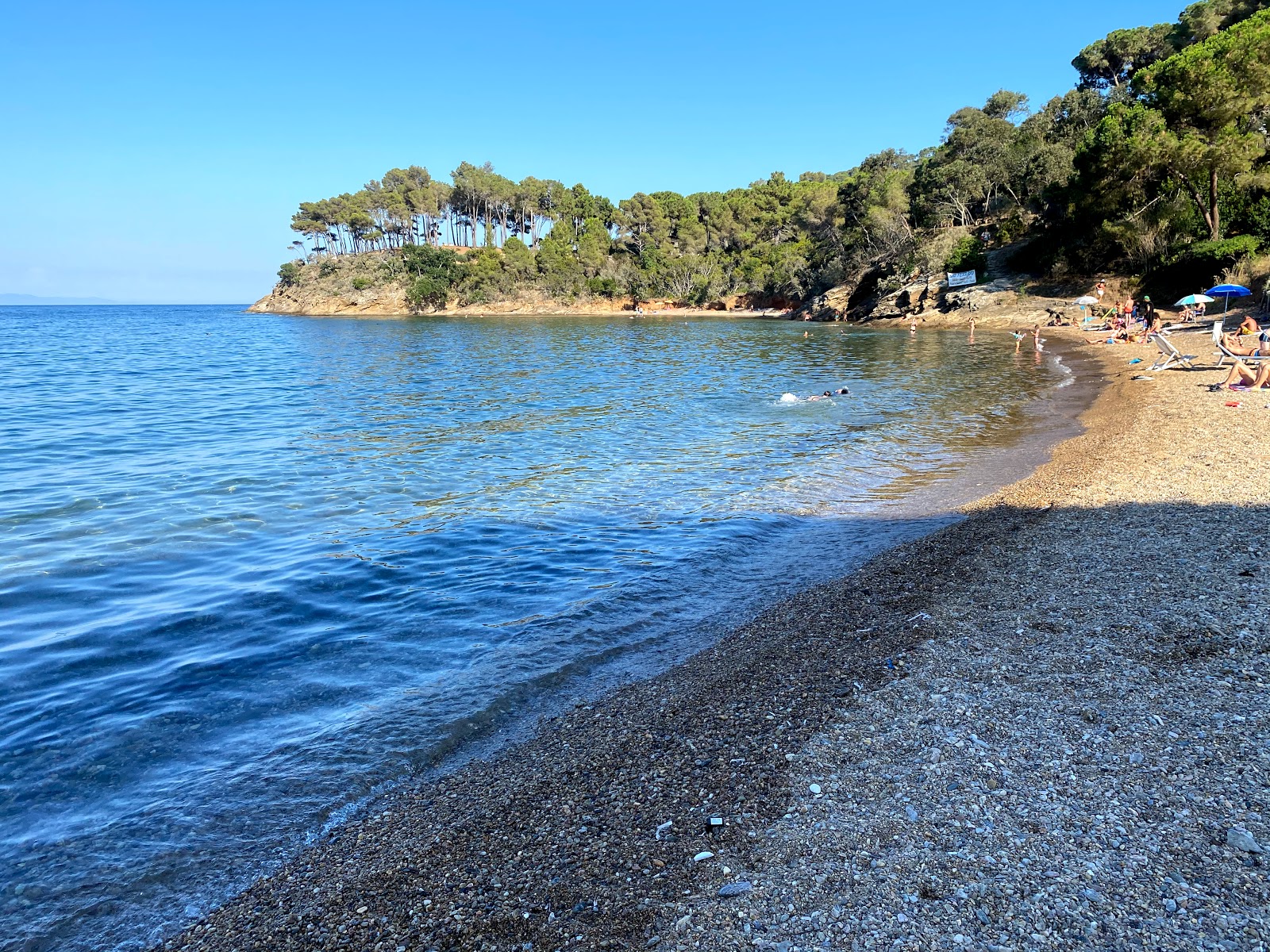 Foto van Ferrato beach met turquoise puur water oppervlakte