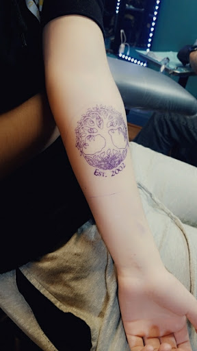 Tattoo Shop «Lovely Monkey Tattoo», reviews and photos, 9541 Main St, Whitmore Lake, MI 48189, USA