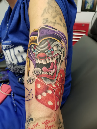 Explore cover up tattoo ideas on arm, creative tattoo ideas in Georgetown, available at Body Art Tattoos