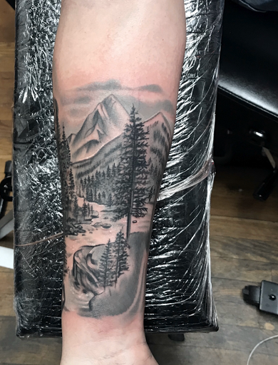 Explore son tattoo ideas, creative tattoo ideas in Silver City, available at Independent Ink Tattoo